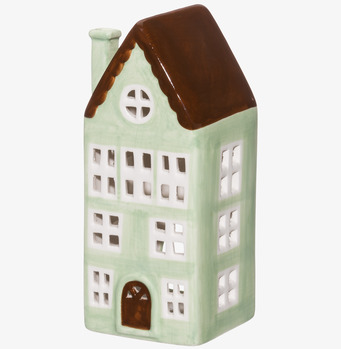 Bild av charmig ljuslykta formad som ett grönt hus