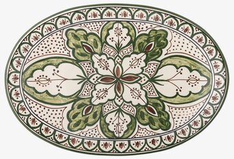 Bild av ovalt serveringsfat med blommönster och bladmotiv