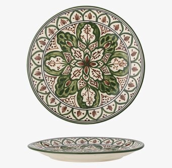 Bild av elegant assiett med grönt mönster och glansig yta