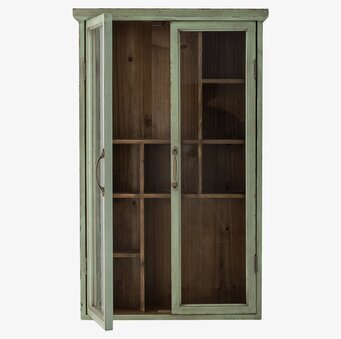 Foto av grönt väggskåp med rustik och tidlös design