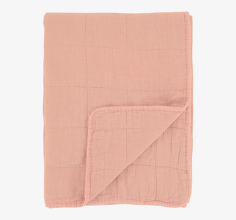 Bild av mjuk rosa pläd med vintage känsla och charm