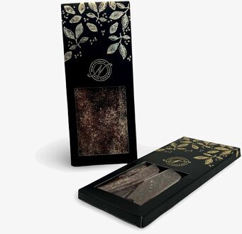 Bild av elegant förpackning med vit choklad och lakrits