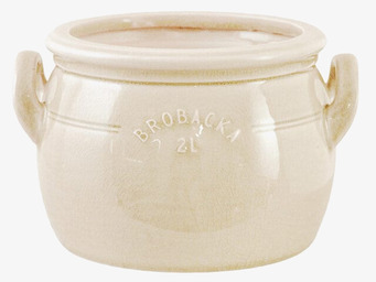 Bild av krämvit låg kruka med handtag och tidlös design