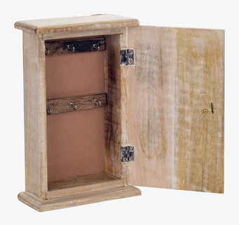 Bild på nyckelskåp i laserat trä med metallkrokar och fot