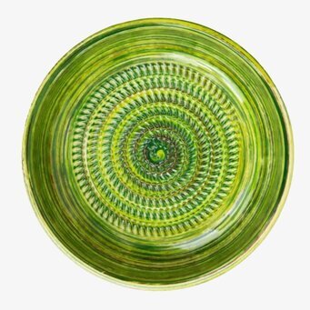 Bild av handgjort keramiskt rivjärn i gröna nyanser