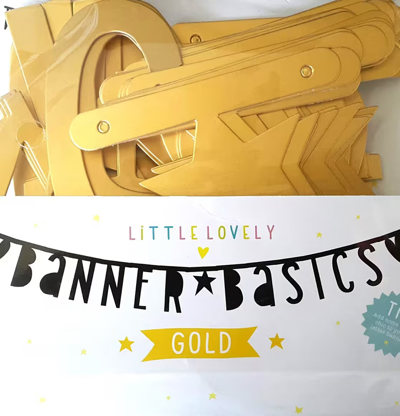 Banner Basics Gold från A Little Lovely Company i förpackning