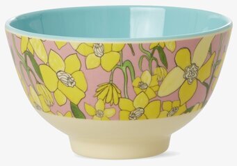 Bild av liten skål med påskliljor och mintblå insida