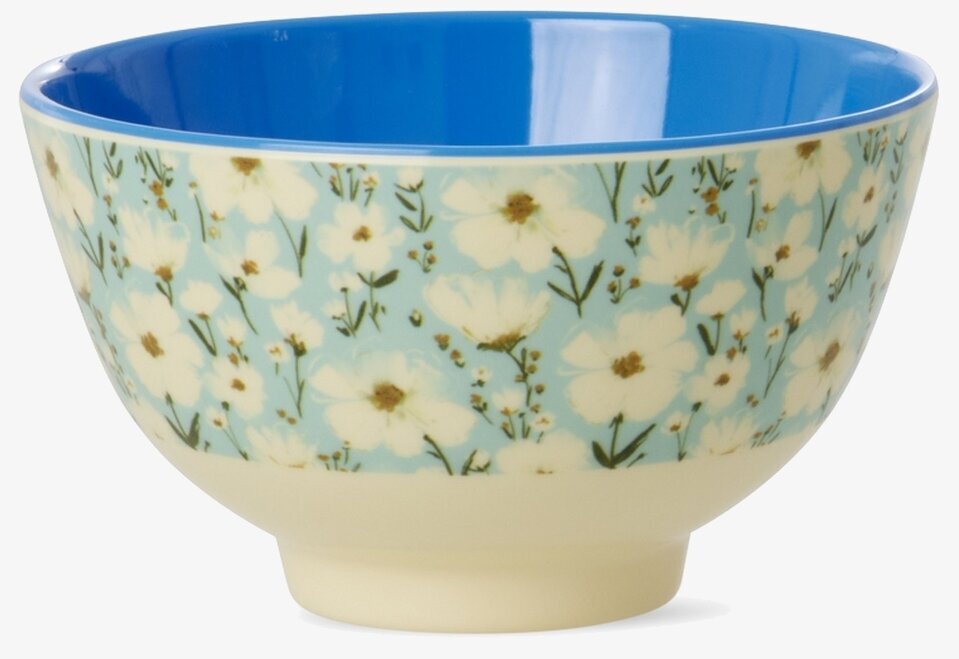 Bild av liten blommig skål med blå insida och pastelltoner