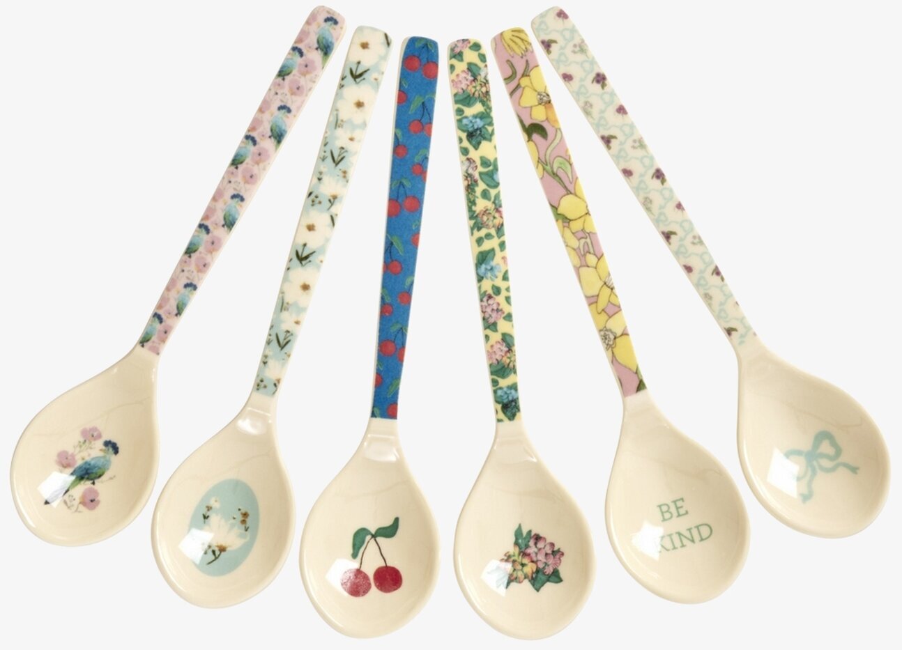 Bild på färgglada teskedar i melamin med blommor och motiv