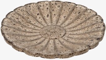 Bild av cirkelformat fågelbad med naturinspirerad struktur