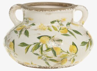 Bild på krämvit kruka med citronmotiv och rustika detaljer