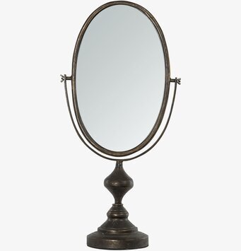 Bild på oval bordsspegel i svart metall med klassisk fot