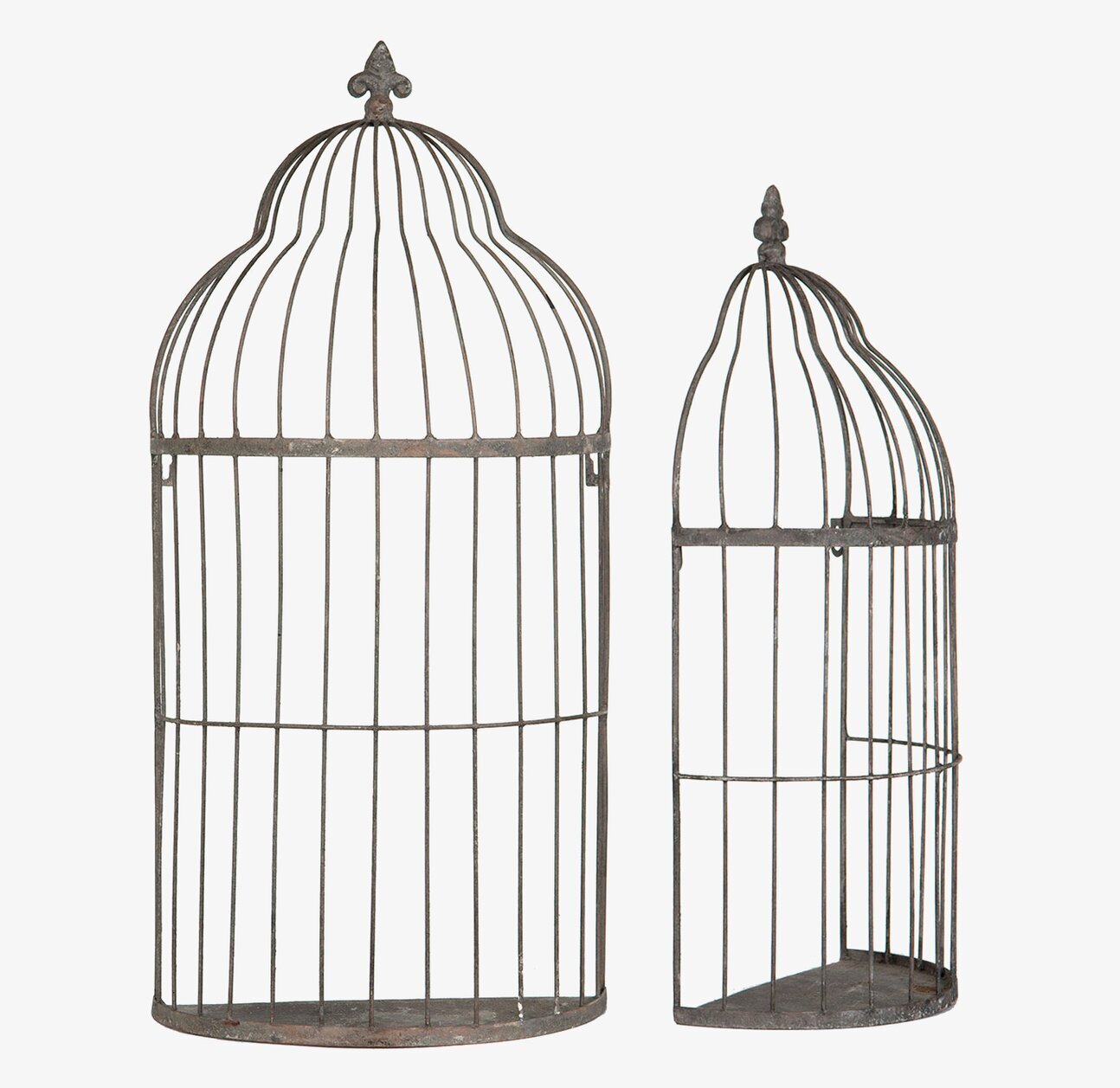 Bild på två dekorativa metallburar för vägg eller hylla hemma