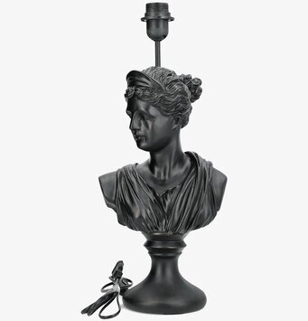 Bild av svart lampfot byst – konstnärlig inredningsdetalj