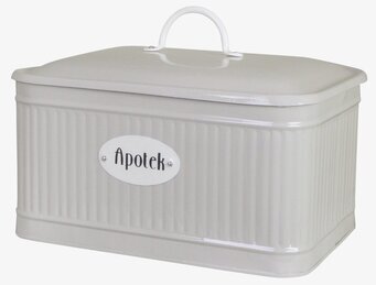 Bild på beige rektangulär plåtburk med skylt och handtag