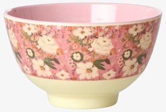 Bild av liten skål med blommigt mönster och rosa insida