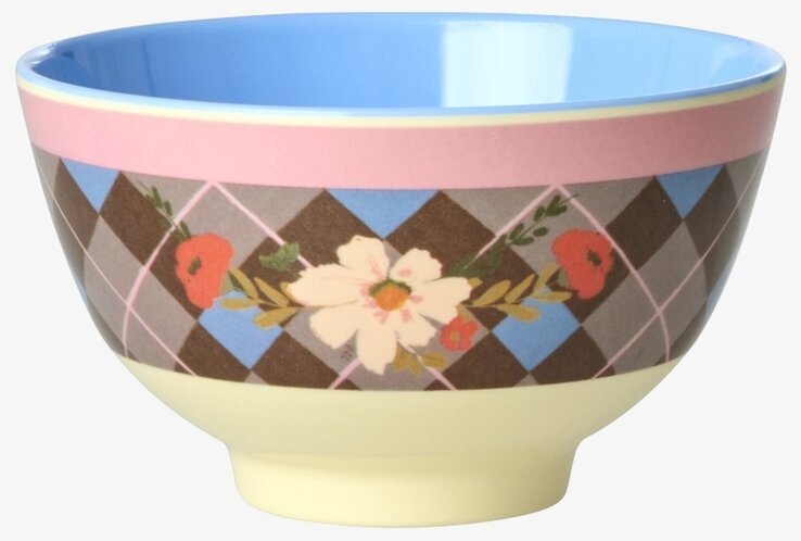Bild av liten färgglad skål med blommigt och rutigt mönster