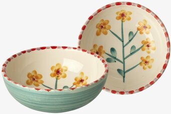 Bild av keramikskålar med blommor och blågrön utsida