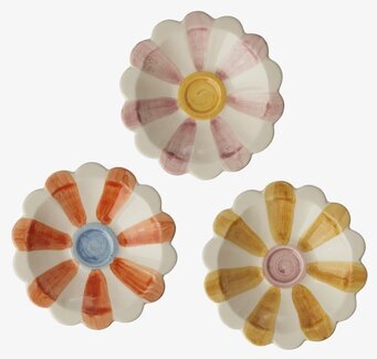 Bild på färgglada blomformade dippskålar i keramik för hemmet