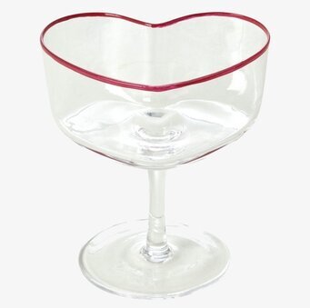 Bild på champagneglas med hjärtformad kupa och röd kant