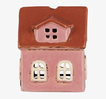 Bild av liten rosa ljuslykta i form av hemtrevligt keramikhus