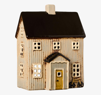 Bild av dekorativt ljushus i nordisk stil med cykeldetalj