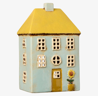 Bild av dekorativ ljuslykta i keramik med gult tak och blomma