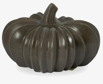 Bild av dekorativ grön keramikpumpa för stilren höstinredning