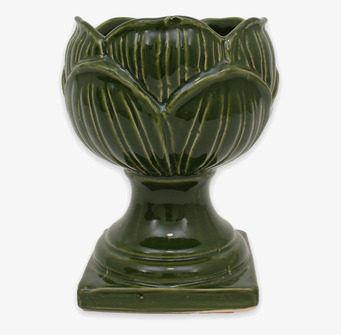 Bild av grön pokalkruka med bladrelief och glansig yta