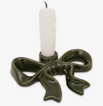 Bild av grön rosettformad keramikljusstake med glansig yta