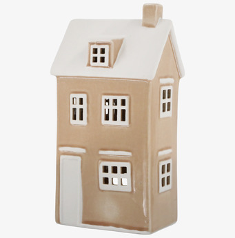 Bild av dekorativ puderrosa ljuslykta i form av ett hus