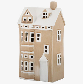 Bild av dekorativ ljuslykta som keramikhus i pudertoner