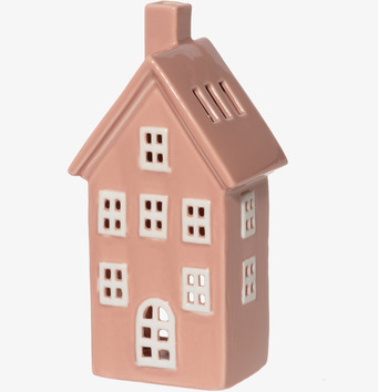 Bild av rosa keramikhus-lykta med vita detaljer och fönster