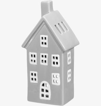 Bild av dekorativ ljuslykta i form av stilrent keramikhus