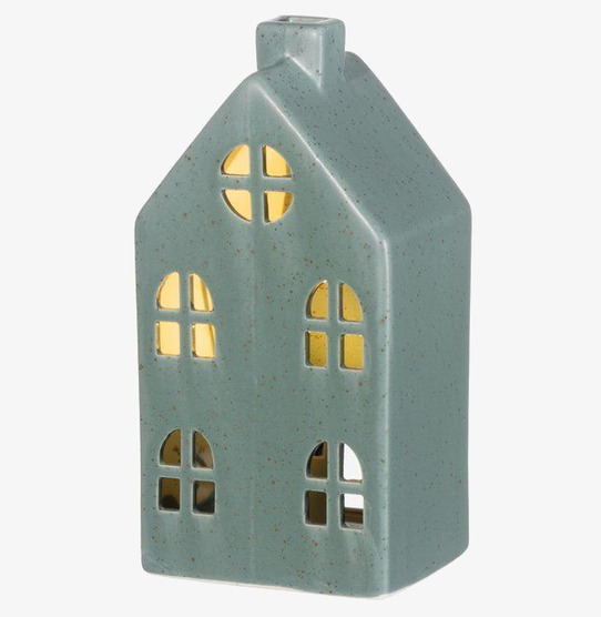Bild på dekorativt mörkgrönt keramikhus med LED-belysning