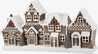 Bild av dekorativt pepparkakshus med snö och juldetaljer