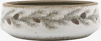 Bild av låg keramikkruka med tallkvistmotiv och naturkänsla