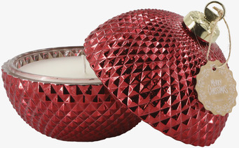 Bild av röd dekorativ ljuskula med vitt ljus och gulddetalj