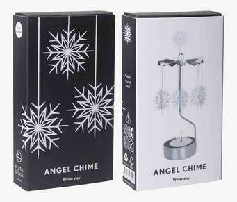 Bild på två eleganta förpackningar med vit stjärndesign