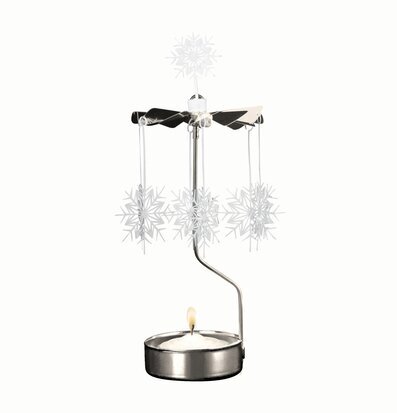 Bild av klassiskt änglaspel med vita snöflingor och värmeljus