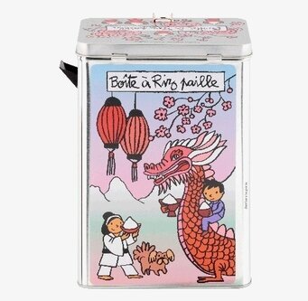 Bild på färgglad asiatisk plåtburk med drake och rismotiv