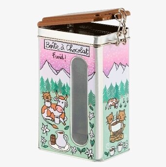 Bild på färgglad plåtburk för kakao med lekfull design