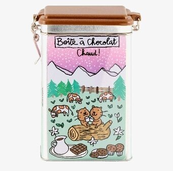 Bild av färgstark plåtburk med idylliskt landsbygdsmotiv