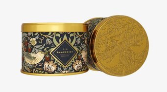 Bild på dekorativ burk med pepparkakor och naturmönster