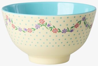 Foto: Liten prickig skål med blomsterbård turkos insida