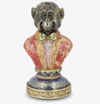 Foto: Apbyst i röd kavaj med guld- och blå bas﻿