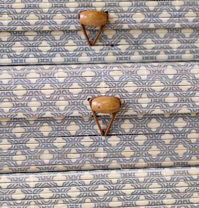 Foto: Staplade mönstrade förvaringsaskar med knoppar