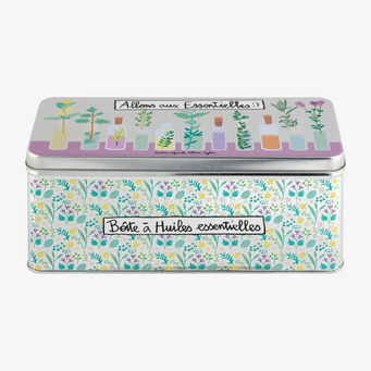 Foto av plåtburk för eteriska oljor med blommönster