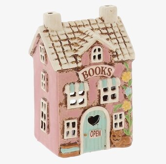 Foto keramikljuslykta husformad bokhandel rosa grått tak