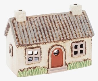 Foto av husformad ljuslykta i keramik mot vit bakgrund